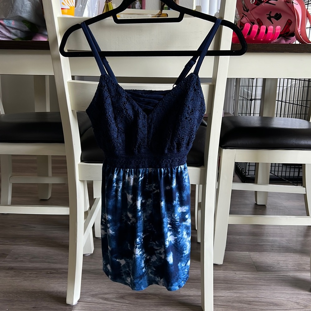 Navy blue spaghetti strap tank top.